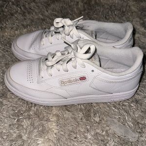 Women’s white Reebok sneakers